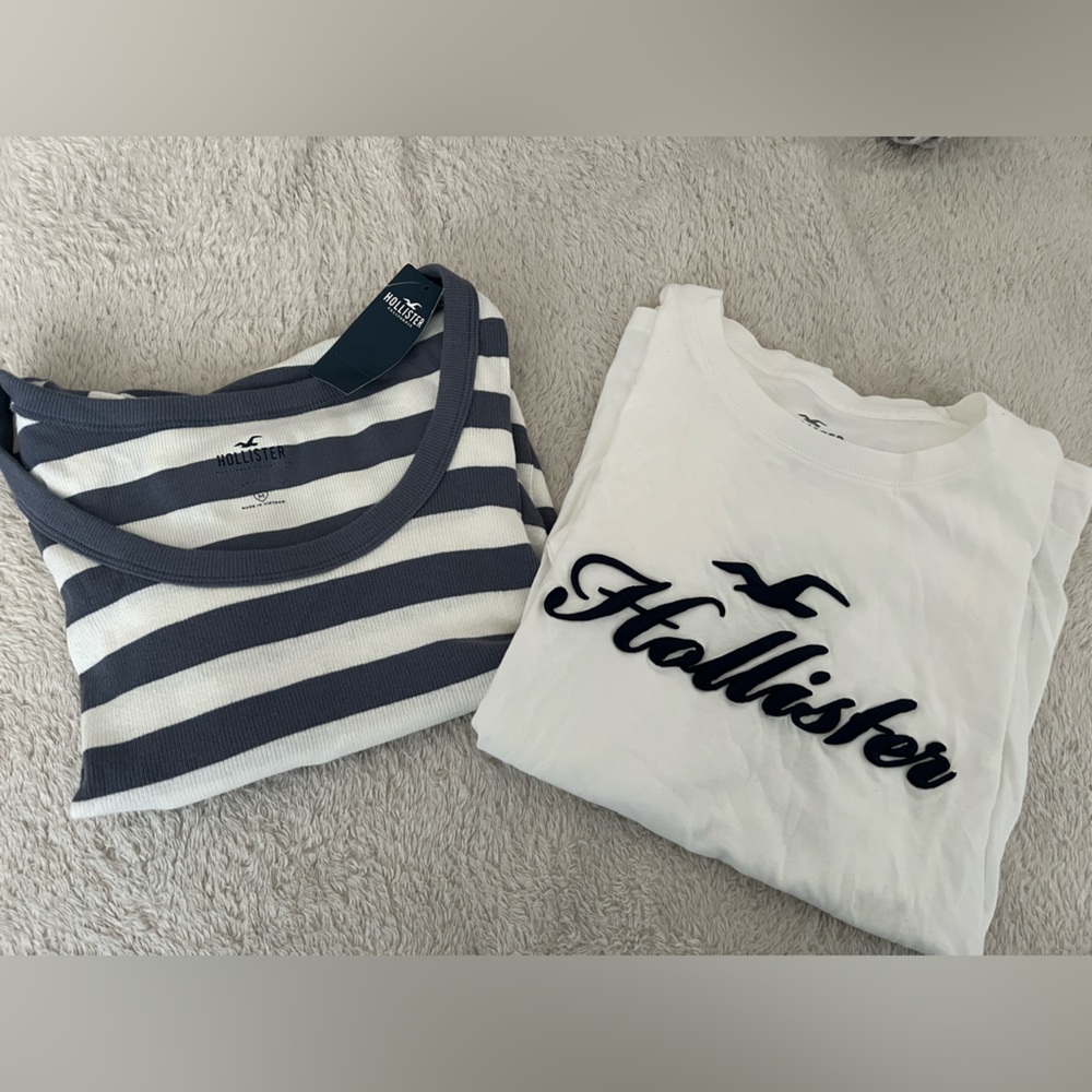 Pack of 2 Hollister Tops, white with navy letters and grey/white striped top
